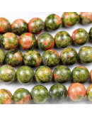 Unakite. 04 milímetros diámetro. 0,8 mm perforación. 90 unidades hilo aproximado. 1 hilo.