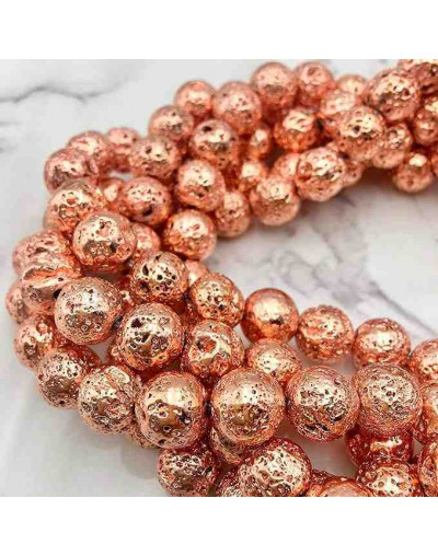 Lava natural. Electroplateado GOLD ROSE. 08 mm diámetro. 1 mm perforación. 45 uds hilo aprox. 1 hilo