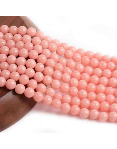 Piedra sintética. Fluorescente. SALMON. 04 mm diámetro. 1 mm perforación. 90 uds hilo aprox. 1 hilo.