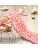 Piedra sintética. Fluorescente. SALMON. 06 mm diámetro. 1 mm perforación. 60 uds hilo aprox. 1 hilo.