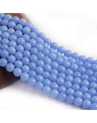 Piedra sintética. Fluorescente. BLUE. 06 mm diámetro. 1 mm perforación. 60 uds hilo aprox. 1 hilo.