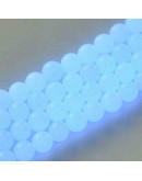 Piedra sintética. Fluorescente. BLUE. 06 mm diámetro. 1 mm perforación. 60 uds hilo aprox. 1 hilo.