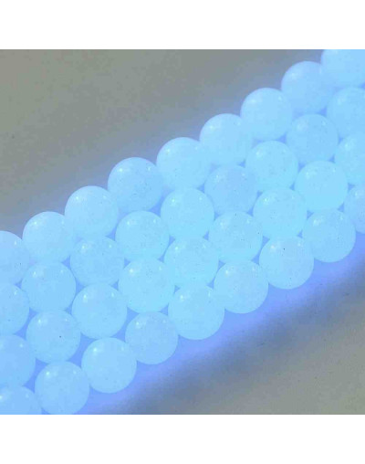 Piedra sintética. Fluorescente. BLUE. 06 mm diámetro. 1 mm perforación. 60 uds hilo aprox. 1 hilo.