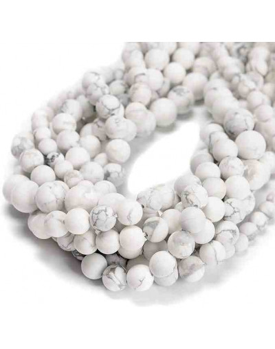 Howlite natural. Blanco mate. 06 milímetros diámetro. 1 mm perforación. 60 uds hilo aprox. 1 hilo.