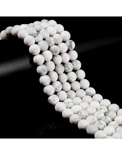 Howlite natural. Blanco mate. 08 milímetros diámetro. 1 mm perforación. 45 uds hilo aprox. 1 hilo.