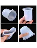 Vaso medidas. Silicona. 6x7 centímetros. 100 ml de capacidad. 1 unidad. Vaso medidas. Silicona. 6x7 centímetros. 100 ml de capacidad. 1 unidad.