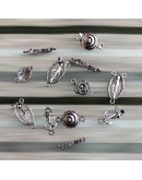 Varios (1). Aleación de cobre. Color plata antigua. De 18 a 25 milímetros. 11 piezas. 1 set.