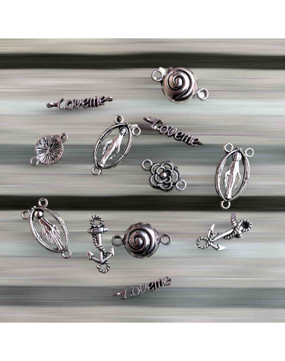 Varios (1). Aleación de cobre. Color plata antigua. De 18 a 25 milímetros. 11 piezas. 1 set.