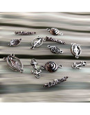 Varios (1). Aleación de cobre. Color plata antigua. De 18 a 25 milímetros. 11 piezas. 1 set.