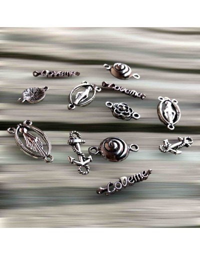 Varios (1). Aleación de cobre. Color plata antigua. De 18 a 25 milímetros. 11 piezas. 1 set.