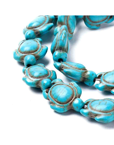 Howlite sintético. Tortugas. Color azul. 18x14x7.5 mm. 1,5 mm perforación. 22 uds hilo aproximado.