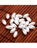 Ovalo. Imitación perla. Color White. 8x4 milímetros. 0,5 mm perforación. 100 unidades aproximado.