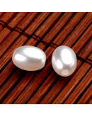 Ovalo. Imitación perla. Color White. 9x7 milímetros. 2 mm perforación.  100 unidades aproximado.