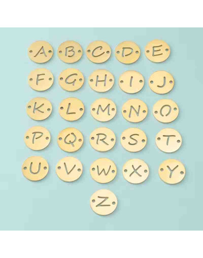 Link letra "W". Acero inoxidable. Color dorado. 13 mm diámetro. 1,5 mm perforación. 1 unidad.