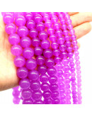 Calcedonia. Magenta. 08 milímetros diámetro. 1 mm perforación. 45 unidades hilo (aproximado).