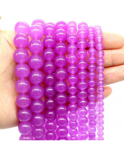 Calcedonia. Magenta. 06 milímetros diámetro. 1 mm perforación. 60 unidades hilo (aproximado).