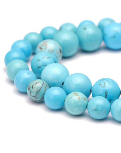 Howlite natural. Teñido turquesa. 4 mm diámetro. 0,8 mm perforación. 90 uds hilo aprox. 1 hilo.