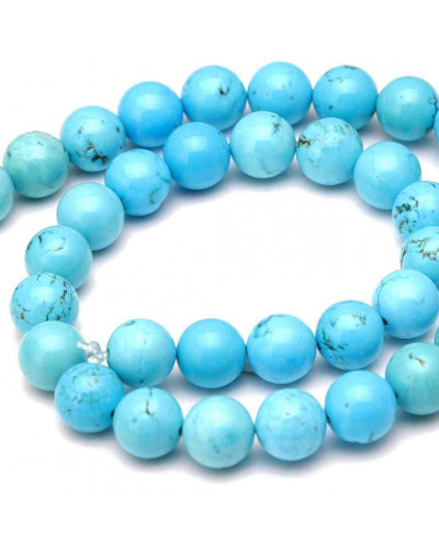 Howlite natural. Teñido turquesa. 4 mm diámetro. 0,8 mm perforación. 90 uds hilo aprox. 1 hilo.