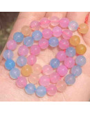 Calcedonia. Varios colores. 04 milímetros diámetro. 1 mm perforación. 90 uds hilo aprox. 1 hilo.