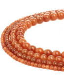 Aventurina. Naranja. 10 milímetros diámetro. 1 mm perforación. 35 uds hilo aprox. 1 hilo.