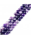 Amatista Ghost. 8 mm diámetro. 1 mm perforación. 45 uds hilo aprox. 1 hilo.