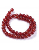 Carnelian. 10 milímetros diámetro. 1 milímetro perforación. 35 unidades hilo (aproximado).