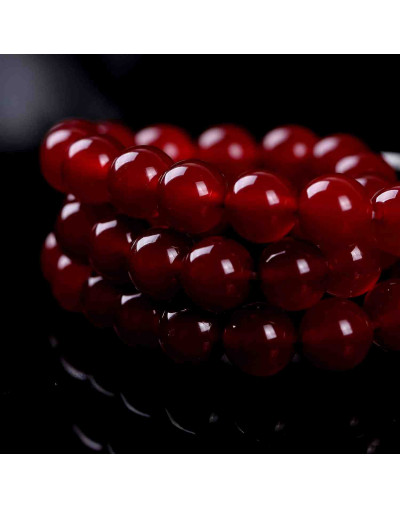 Calcedonia. DARK RED. 04 milímetros diámetro. 1 mm perforación. 90 uds hilo aprox. 1 hilo.