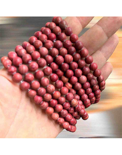 Piedra natural. Líneas rojas. 06 milímetros diámetro. 1 mm perforación. 60 uds hilo aprox. 1 hilo.