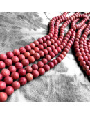 Piedra natural. Líneas rojas. 06 milímetros diámetro. 1 mm perforación. 60 uds hilo aprox. 1 hilo.