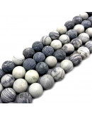 Piedra natural. Líneas negras. Frost. 06 mm diámetro. 1 mm perforación. 60 uds hilo aprox. 1 hilo.