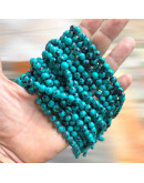 Turquesa sintética. Xinjiang BLUE. 04 mim diámetro. 0,8 mm perforación. 90 uds hilo aprox. 1 hilo.