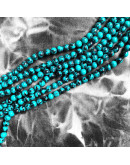 Turquesa sintética. Xinjiang BLUE. 04 mim diámetro. 0,8 mm perforación. 90 uds hilo aprox. 1 hilo.