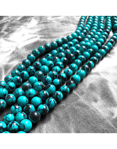 Turquesa sintética. Xinjiang BLUE. 06 mim diámetro. 1 mm perforación. 60 uds hilo aprox. 1 hilo.