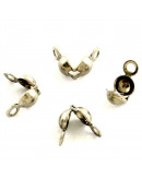 Tapa nudos Acero.inoxidable. Color plateado. 8x4 milímetros. 1.5 mm agujero. 500 uds aprox.