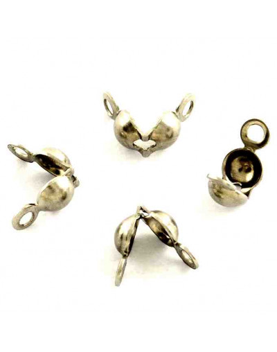 Tapa nudos Acero.inoxidable. Color plateado. 8x4 milímetros. 1.5 mm agujero. 500 uds aprox.