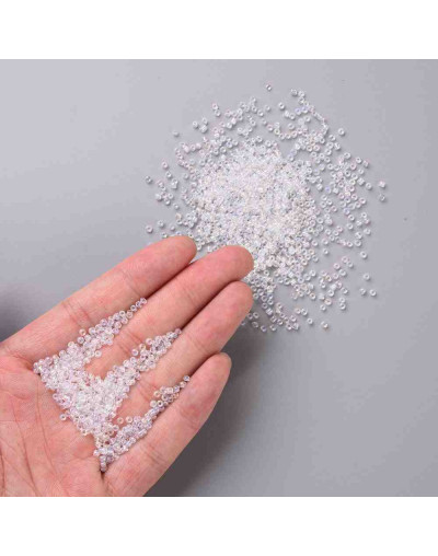 Chaquira. 2 mm. Cristal Arcoiris. CLEAR. 1 mm perforación. 1 libra. 30000 uds aprox.