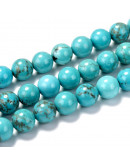 Magnesita  natural. 08 mm diámetro. 1 mm perforación. 45 unidades hilo (aproximado)