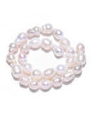 Perla natural de río. Forma irregular Lágrima. 5~9x5~7 mm. 0,6 mm perforación. 25 uds aprox.