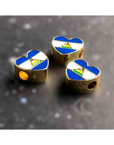 Nicaragua Corazón. Aleación de Cobre. Baño 18K Gold. 12x11x5 milímetros. 3 mm perforacion. 1 ud.