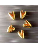 Corazón (6). Aleación de cobre. Baño 18KGold. 13x9x5 milímetros. 13x3 mm perforación. 1 unidad. Corazón (6). Aleación de cobre. Baño 18KGold. 13x9x5 milímetros. 13x3 mm perforación. 1 unidad.