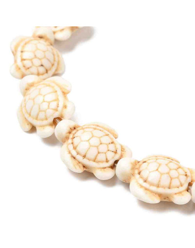 Howlite. Tortugas. Color Seashell. 19x14x7.8 mm. 22 uds hilo aprox. 1 hilo.