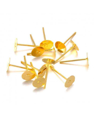 Pin aretes. Aleación de cobre. Color dorado. Pin 0,7 milímetros. Base 6 mm. Cierre silicón. 40 uds.