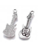 Guitarra eléctrica. Aleación de cobre. Color plata antigua. 31x11x2 mm. 2 mm perforación. 5 unidades Guitarra eléctrica. Aleación de cobre. Color plata antigua. 31x11x2 mm. 2 mm perforación. 5 unidades