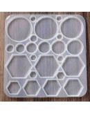 Molde de silicona. Para resina. Monedas y hexágonos. 157x153 milímetros. Sin perforación. 1 unidad. Molde de silicona. Para resina. Monedas y hexágonos. 157x153 milímetros. Sin perforación. 1 unidad.