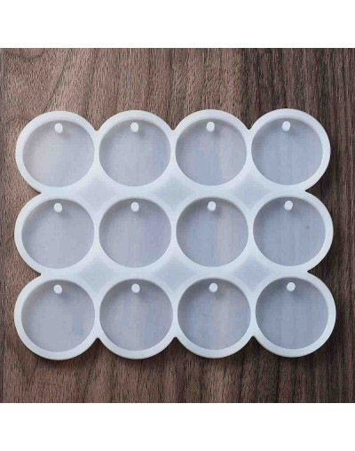 Molde de silicona. Para resina. Monedas. 121x153 milímetros. 3,5 mm perforación. 1 unidad.