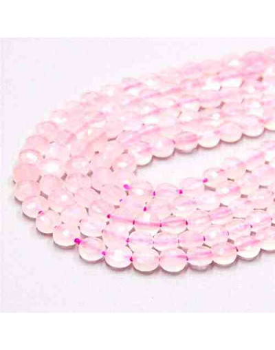 Cuarzo Rosa. Moneda faceteada. 6x4 milímetros. 1 mm perforación. 55 uds hilo aprox. 1 hilo.