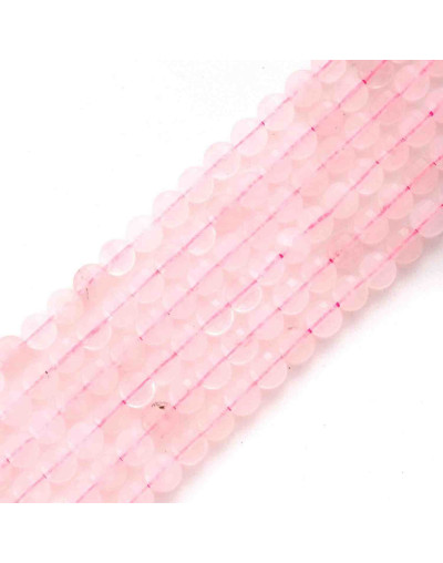 Cuarzo Rosa. Moneda faceteada. 6x4 milímetros. 1 mm perforación. 55 uds hilo aprox. 1 hilo.