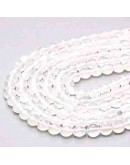 Cuarzo Cristal. Moneda faceteada. 6x4 milímetros. 1 mm perforación. 55 uds hilo aprox. 1 hilo.