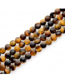 Ojo de Tigre. Moneda faceteada. 6x4 milímetros. 1 mm perforación. 55 uds hilo aprox. 1 hilo.