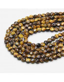 Ojo de Tigre. Moneda faceteada. 6x4 milímetros. 1 mm perforación. 55 uds hilo aprox. 1 hilo.